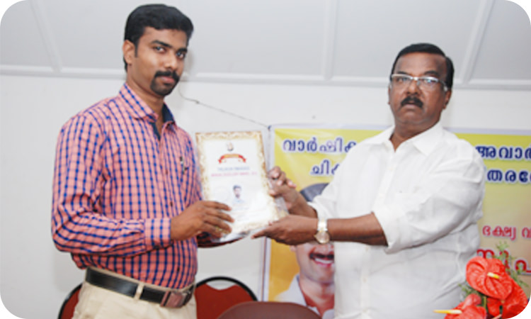 Received by Mr.Joby K.P. Director Lazzaro Academy from Mr. C.Divakaran, M.L.A