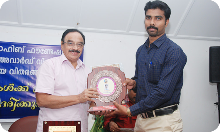 Received by Mr.Joby K.P. Director Lazzaro Academy from Hon. Educational Minister P.K. Abdu Rabb.